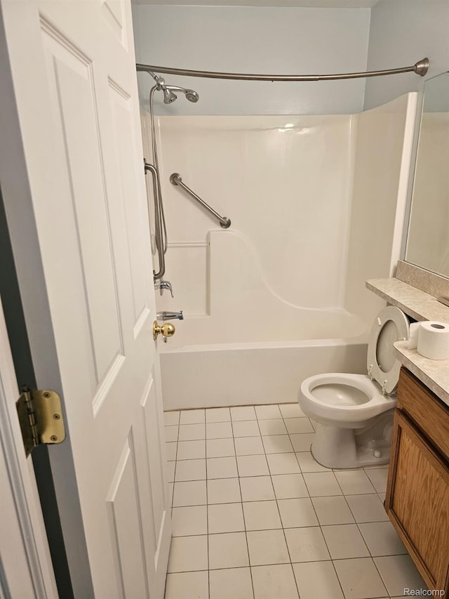 22835 Woodcreek Dr Unit 32, Taylor, MI 48180 - bathroom with vanity, tile patterned floors, washtub / shower combination, and toilet