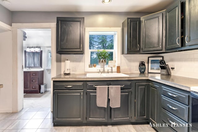 12577 Redmond Ave NE, Cedar Springs, MI 49319 - kitchen featuring a sink, backsplash, recessed lighting, and baseboards