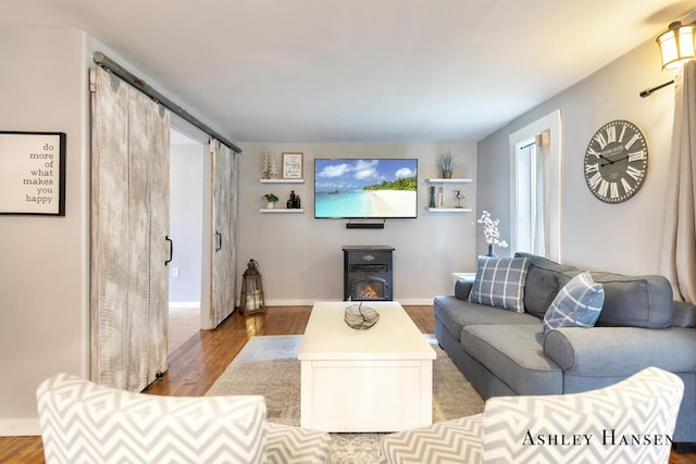 12577 Redmond Ave NE, Cedar Springs, MI 49319 - living room featuring wood finished floors and baseboards