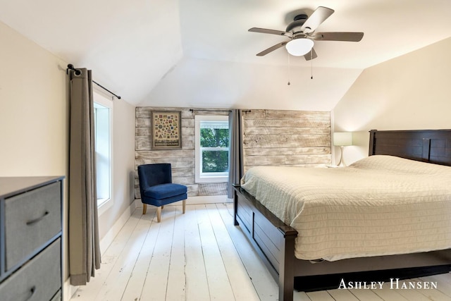 12577 Redmond Ave NE, Cedar Springs, MI 49319 - bedroom featuring lofted ceiling, light wood-style flooring, and ceiling fan