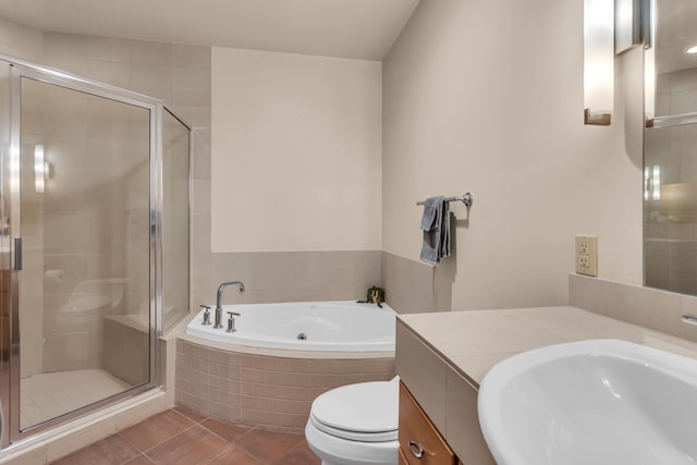 109 W Washington Ave Unit 16, Jackson, MI 49201 - full bath with toilet, a garden tub, vanity, a shower stall, and tile patterned floors