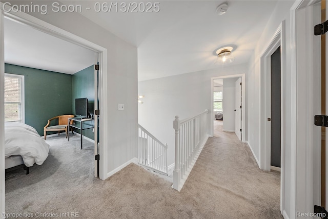 9840 Oak Valley Dr, Clarkston, MI 48348 - corridor with an upstairs landing, carpet flooring, and baseboards