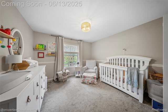 9840 Oak Valley Dr, Clarkston, MI 48348 - carpeted bedroom with a nursery area and baseboards