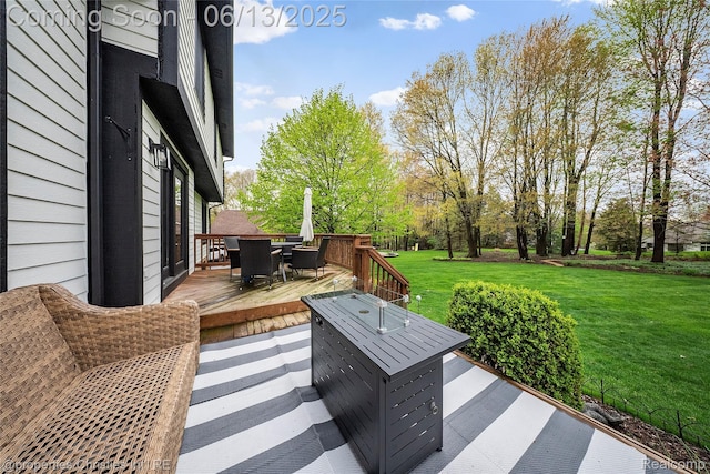9840 Oak Valley Dr, Clarkston, MI 48348 - deck with outdoor dining area and a lawn