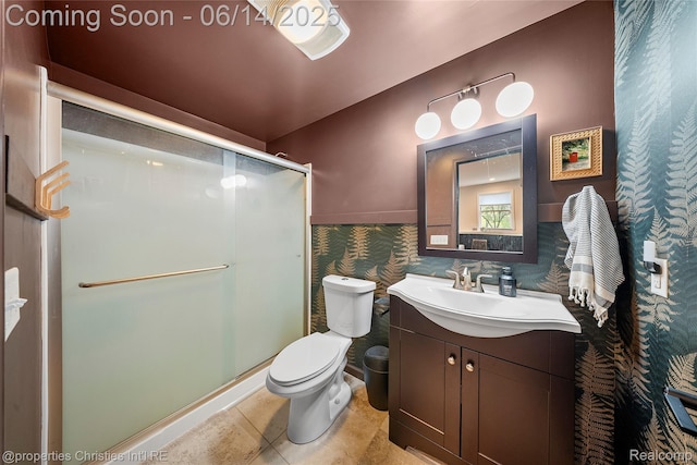 9840 Oak Valley Dr, Clarkston, MI 48348 - bathroom with vanity, toilet, a shower stall, and tile patterned floors