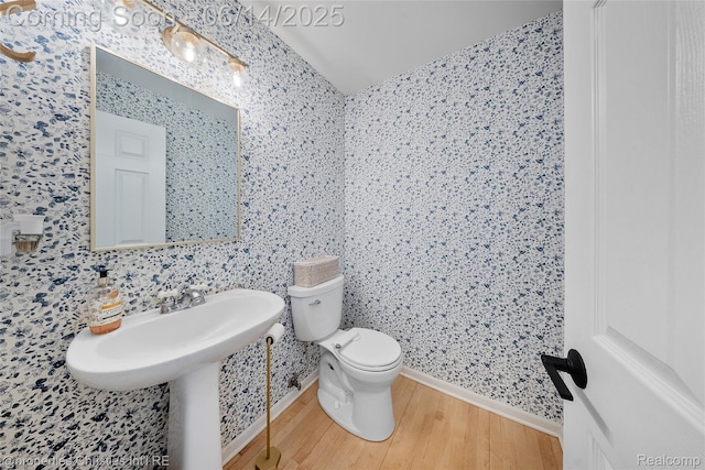 9840 Oak Valley Dr, Clarkston, MI 48348 - bathroom featuring wood finished floors and toilet