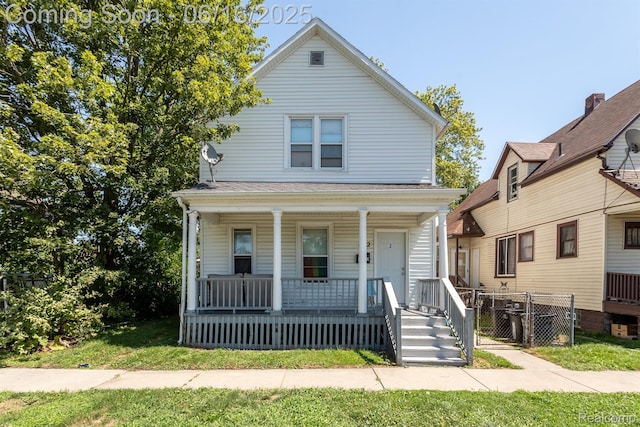 1012 8th St, Port Huron, MI 48060 - view of front of property featuring covered porch