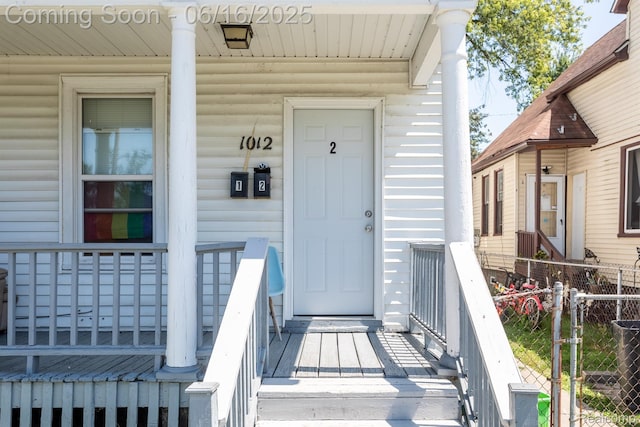1012 8th St, Port Huron, MI 48060 - doorway to property featuring a porch