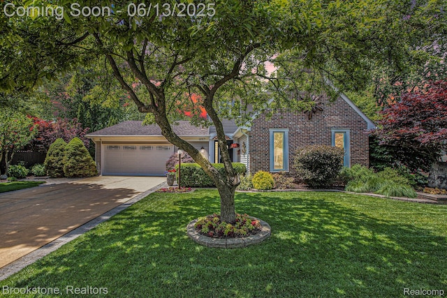 4057 Cypress Dr, Troy, MI 48085 - view of front of house featuring a garage, concrete driveway, brick siding, and a front yard