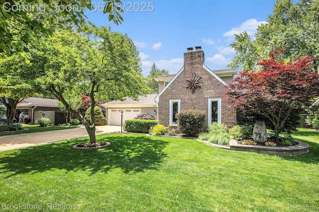 4057 Cypress Dr, Troy, MI 48085 - tudor-style house with driveway, brick siding, a front lawn, an attached garage, and a chimney