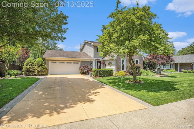 4057 Cypress Dr, Troy, MI 48085 - obstructed view of property with concrete driveway, an attached garage, and a front lawn