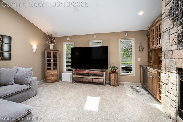 4057 Cypress Dr, Troy, MI 48085 - living room featuring light carpet, a fireplace, baseboards, and recessed lighting