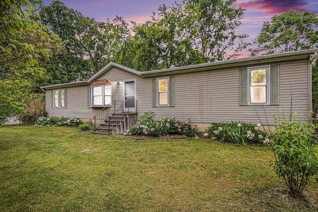 67173 Bulhand Rd, Cassopolis, MI 49031 - manufactured / mobile home featuring a lawn