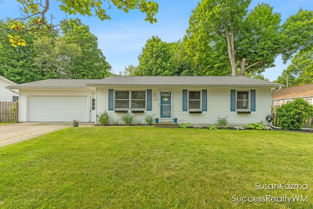 111 W 1st Ave, Plainwell, MI 49080 - single story home with a garage, driveway, and entry steps