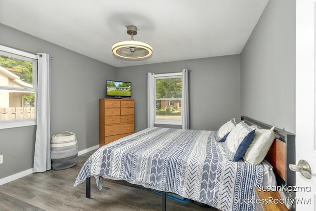 111 W 1st Ave, Plainwell, MI 49080 - bedroom featuring wood finished floors and baseboards