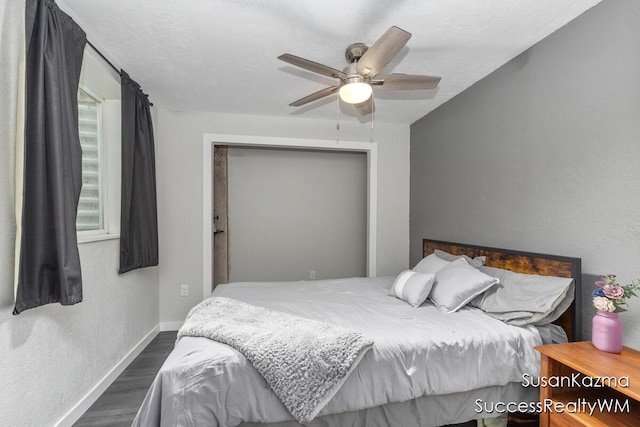 111 W 1st Ave, Plainwell, MI 49080 - bedroom with wood finished floors, baseboards, and ceiling fan