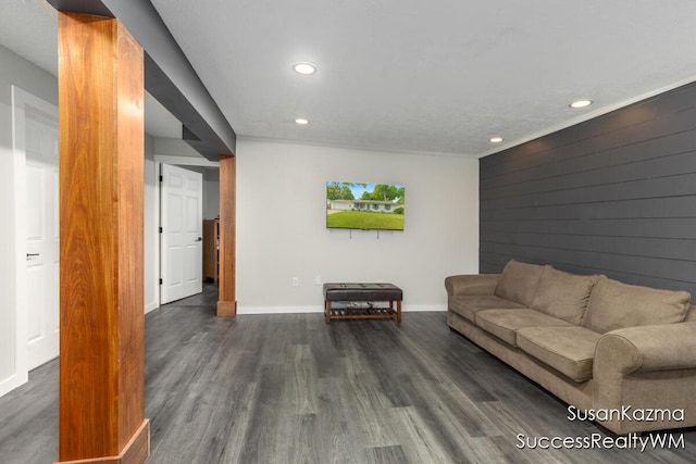 111 W 1st Ave, Plainwell, MI 49080 - living room featuring recessed lighting, dark wood finished floors, and baseboards