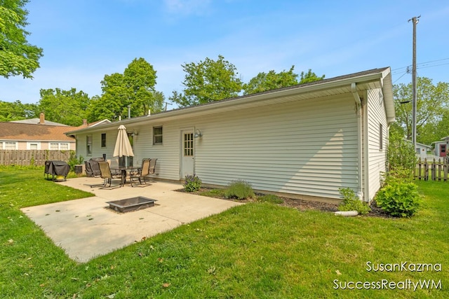 111 W 1st Ave, Plainwell, MI 49080 - back of house with a patio