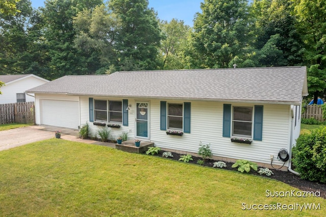 111 W 1st Ave, Plainwell, MI 49080 - single story home with driveway, a garage, and roof with shingles