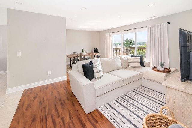 855 S Pontiac Trl Unit A305, Walled Lake, MI 48390 - living area featuring baseboards, recessed lighting, and light wood finished floors