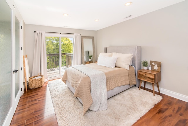 855 S Pontiac Trl Unit A305, Walled Lake, MI 48390 - bedroom with access to outside, wood finished floors, baseboards, and recessed lighting