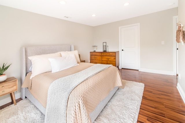 855 S Pontiac Trl Unit A305, Walled Lake, MI 48390 - bedroom featuring wood finished floors, baseboards, and recessed lighting