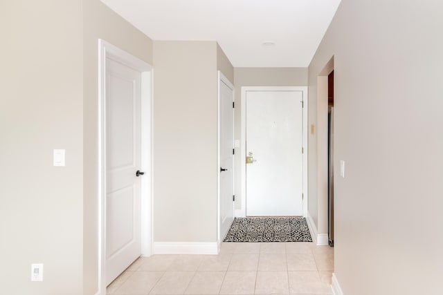 855 S Pontiac Trl Unit A305, Walled Lake, MI 48390 - hall featuring light tile patterned floors and baseboards