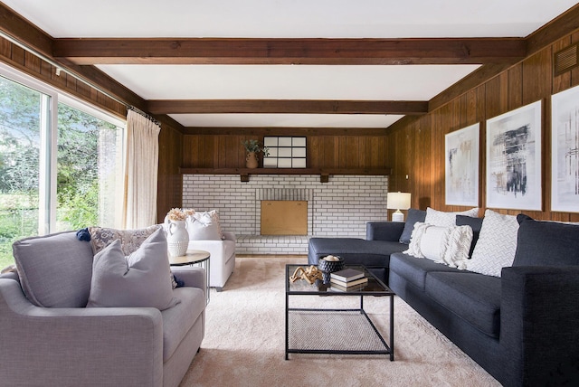 1349 King George Blvd, Ann Arbor, MI 48108 - living area featuring wooden walls, beam ceiling, and carpet flooring