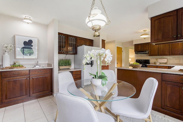 1349 King George Blvd, Ann Arbor, MI 48108 - dining area with light tile patterned floors