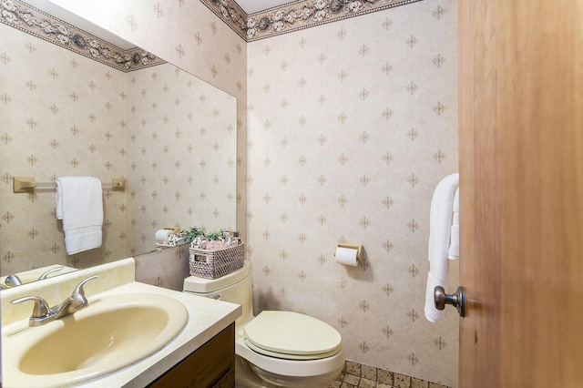 1349 King George Blvd, Ann Arbor, MI 48108 - bathroom with vanity, toilet, and baseboards