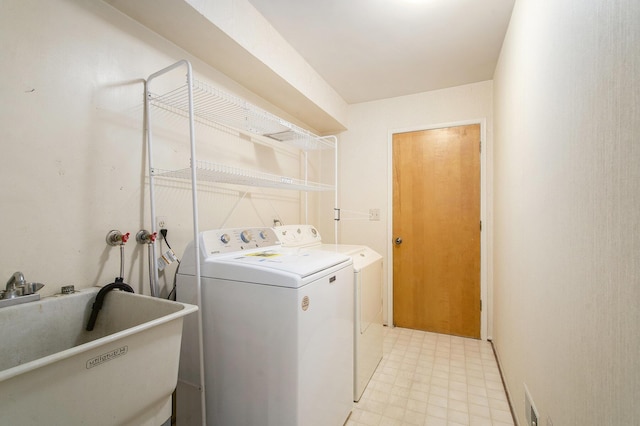 1349 King George Blvd, Ann Arbor, MI 48108 - washroom with washer and dryer and light flooring