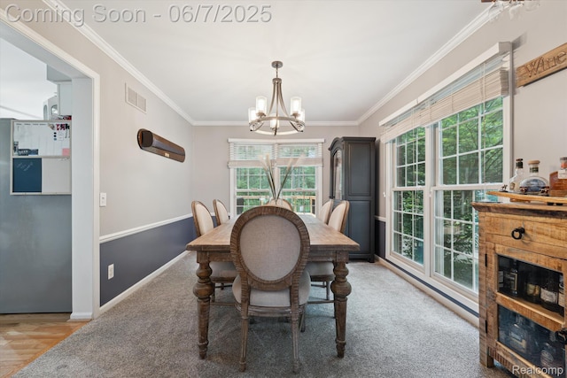 3753 Rolling Hills Rd, Lake Orion, MI 48359 - dining area with a chandelier, ornamental molding, baseboards, a fireplace, and carpet floors