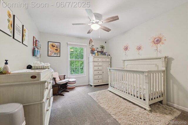 3753 Rolling Hills Rd, Lake Orion, MI 48359 - carpeted bedroom with a crib, baseboards, and ceiling fan