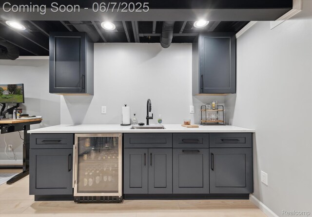 3753 Rolling Hills Rd, Lake Orion, MI 48359 - indoor bar featuring wine cooler and light wood finished floors