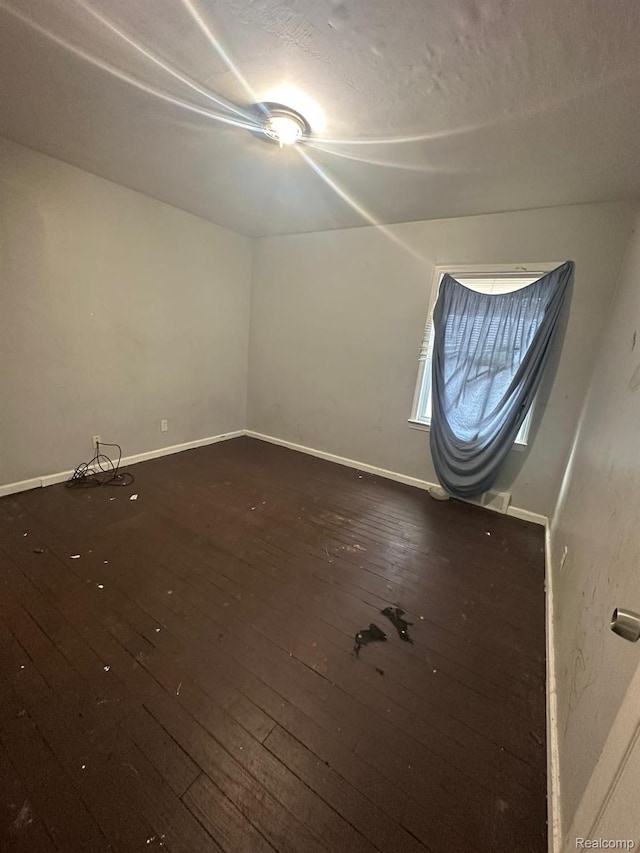 9317 Ward St, Detroit, MI 48228 - unfurnished room featuring hardwood / wood-style floors and baseboards