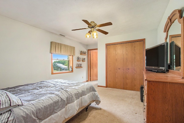 3660 Buffalo Rd, Niles, MI 49120 - bedroom featuring light colored carpet, a closet, and a ceiling fan