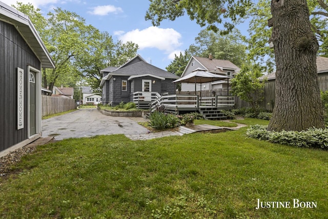 2264 Stafford Ave SW, Grand Rapids, MI 49507 - view of yard featuring a deck, a gazebo, and a patio