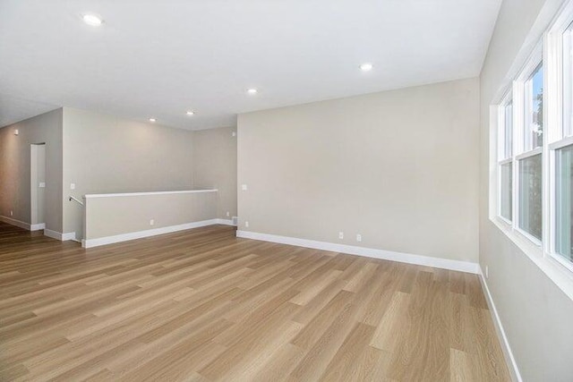 6218 Sturgeon Run, Muskegon, MI 49444 - unfurnished room featuring light wood-type flooring, baseboards, and recessed lighting