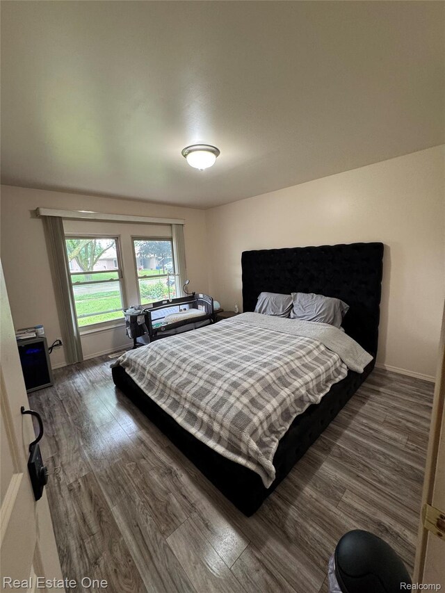 35715 Maureen Dr, Sterling Heights, MI 48310 - bedroom featuring wood finished floors and baseboards
