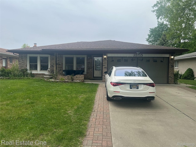 35715 Maureen Dr, Sterling Heights, MI 48310 - view of front of home featuring driveway, brick siding, a garage, a front lawn, and a shingled roof
