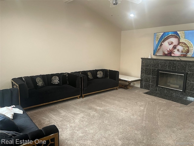 35715 Maureen Dr, Sterling Heights, MI 48310 - living area featuring carpet flooring, vaulted ceiling, ceiling fan, and a tile fireplace