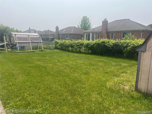 35715 Maureen Dr, Sterling Heights, MI 48310 - view of grassy yard