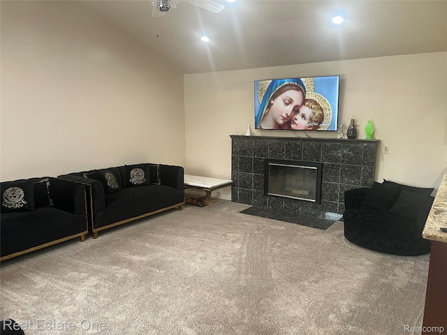 35715 Maureen Dr, Sterling Heights, MI 48310 - living room featuring carpet flooring, a tile fireplace, ceiling fan, recessed lighting, and vaulted ceiling