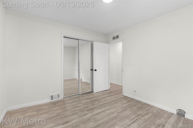 14920 Myola Ave, Warren, MI 48089 - unfurnished bedroom featuring wood finished floors and a closet