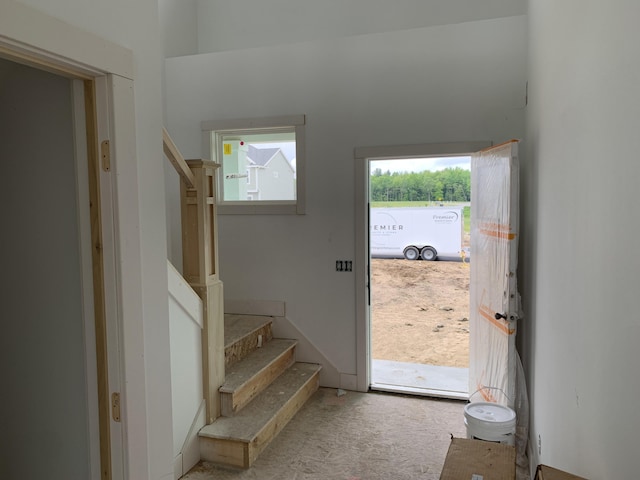 15765 Norwalk Rd, Grand Haven, MI 49417 - foyer with stairs and carpet
