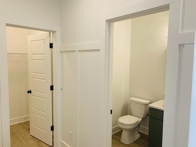15765 Norwalk Rd, Grand Haven, MI 49417 - bathroom featuring wood finished floors and vanity
