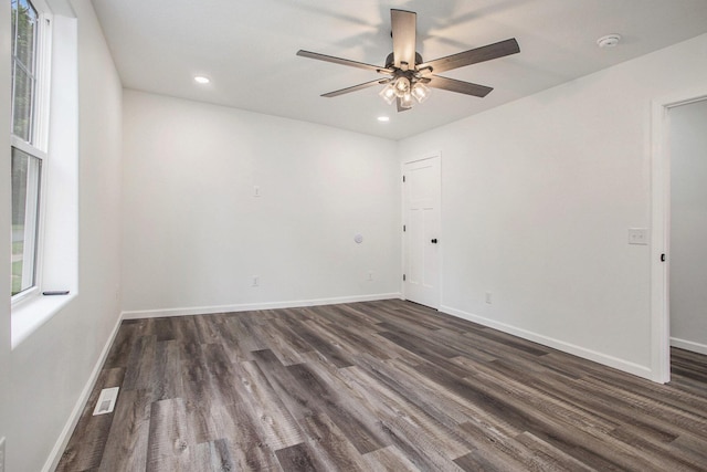 103 W Pearl St, Marshall, MI 49068 - unfurnished room featuring a ceiling fan, dark wood finished floors, a smoke detector, recessed lighting, and baseboards