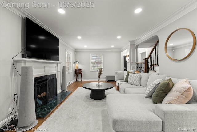 300 S Melborn St, Dearborn, MI 48124 - living area featuring dark wood-style floors, recessed lighting, stairway, crown molding, and decorative columns