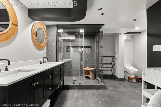 300 S Melborn St, Dearborn, MI 48124 - full bath with double vanity, a shower stall, and toilet
