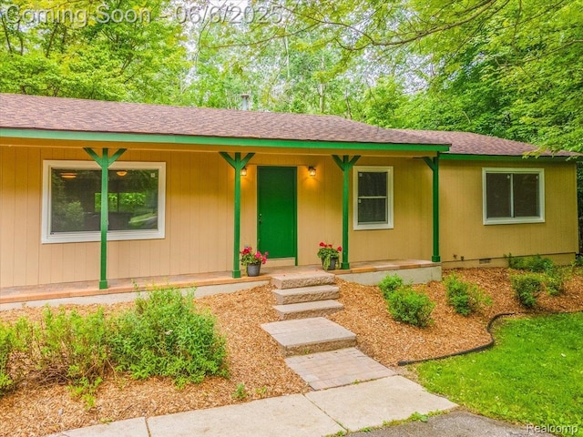 22850 Sumpter Rd, Belleville, MI 48111 - single story home featuring a porch, roof with shingles, and crawl space